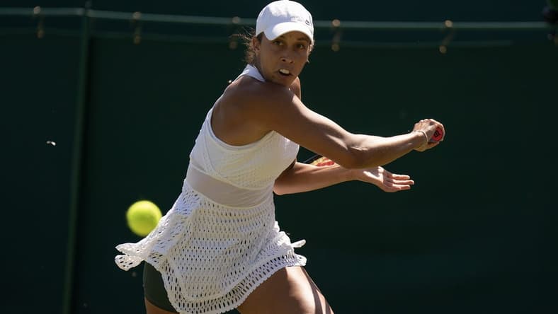 Jul 7, 2023; London, United Kingdom; Madison Keys (USA) returns a shot during her match against Viktorija Golubic (SUI) on day five at the All England Lawn Tennis and Croquet Club.  Mandatory Credit: Susan Mullane-USA TODAY Sports