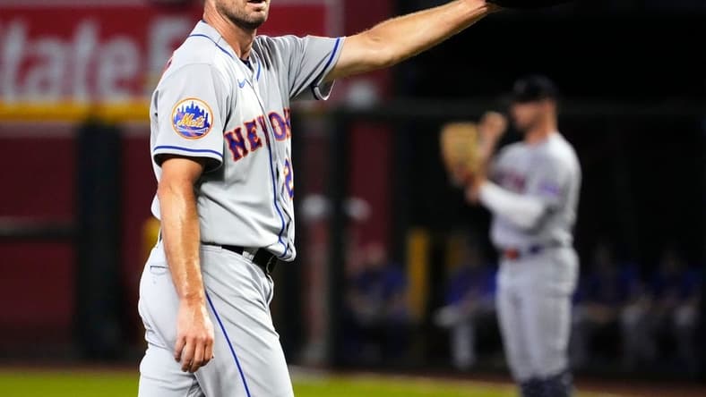 New York Mets starting pitcher Max Scherzer (21) reacts after giving up a home run to Arizona Diamondbacks Corbin Carroll (7) in the first inning at Chase Field in Phoenix on July 4, 2023.