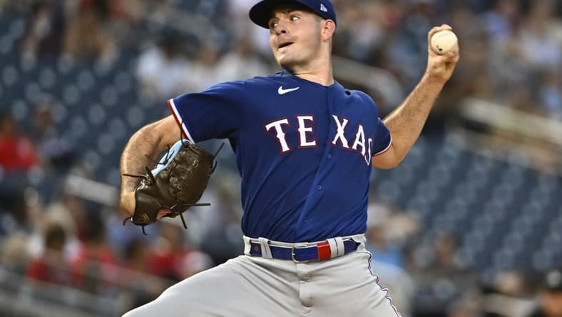 Jul 7, 2023; Washington, District of Columbia, USA; Texas Rangers starting pitcher Cody Bradford (61) throws to the Washington Nationals during the fourth inning at Nationals Park. Mandatory Credit: Brad Mills-USA TODAY Sports