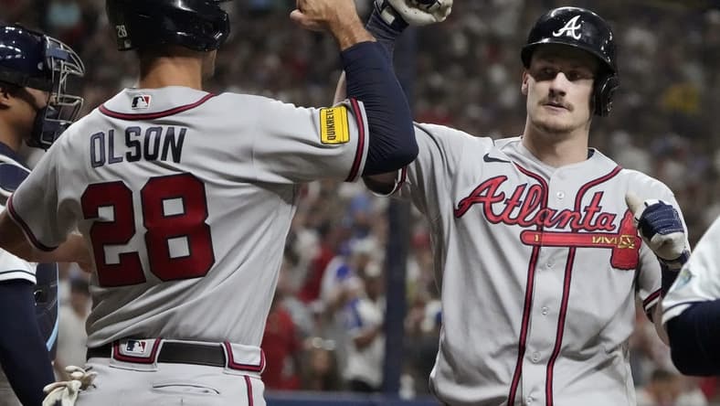 Jul 7, 2023; St. Petersburg, Florida, USA; Atlanta Braves catcher Sean Murphy (12) is congratulated by first baseman Matt Olson (28) after hitting a two run home run against the Tampa Bay Rays during the fourth inning at Tropicana Field. Mandatory Credit: Dave Nelson-USA TODAY Sports