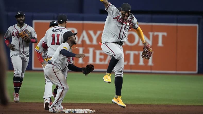 Jul 7, 2023; St. Petersburg, Florida, USA; The Atlanta Braves celebrate after defeating the Tampa Bay Rays at Tropicana Field. Mandatory Credit: Dave Nelson-USA TODAY Sports