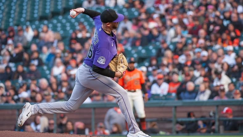Jul 7, 2023; San Francisco, California, USA; Colorado Rockies starting pitcher Austin Gomber (26) throws a pitch during the first inning against the San Francisco Giants at Oracle Park. Mandatory Credit: Ed Szczepanski-USA TODAY Sports