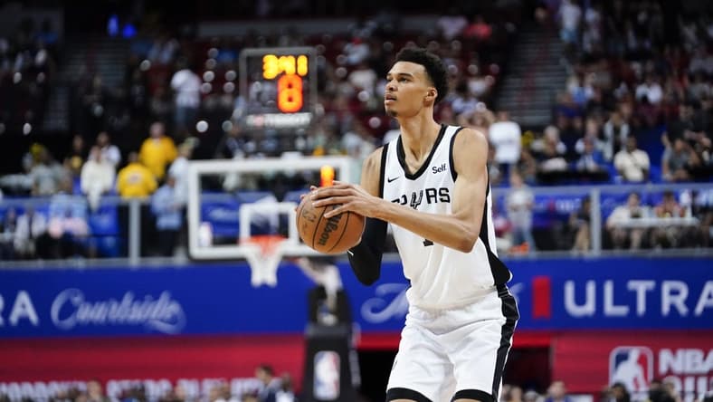 Jul 7, 2023; Las Vegas, NV, USA; San Antonio Spurs forward Victor Wembanyama (1) shoots the ball against the Charlotte Hornets during the second half at Thomas & Mack Center. Mandatory Credit: Lucas Peltier-USA TODAY Sports