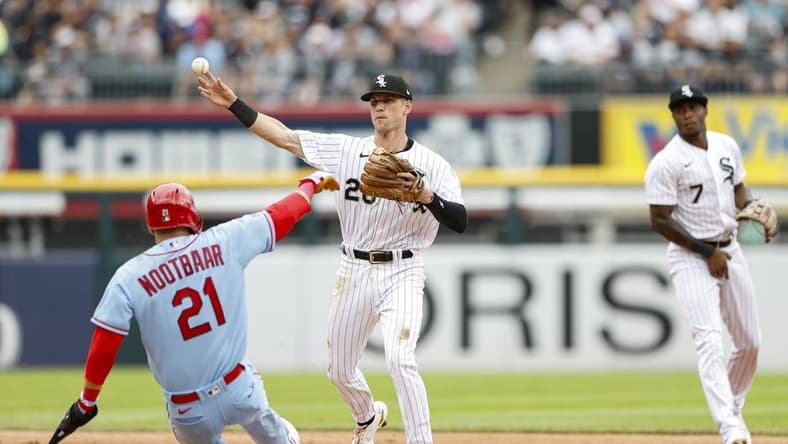 Jul 8, 2023; Chicago, Illinois, USA; Chicago White Sox shortstop Zach Remillard (28) forces out St. Louis Cardinals center fielder Lars Nootbaar (21) at second base during the third inning at Guaranteed Rate Field. Mandatory Credit: Kamil Krzaczynski-USA TODAY Sports