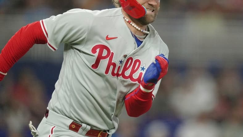 Jul 8, 2023; Miami, Florida, USA; Philadelphia Phillies designated hitter Bryce Harper (3) runs out a double in the first inning against the Miami Marlins at loanDepot Park. Mandatory Credit: Jim Rassol-USA TODAY Sports