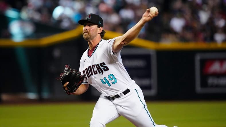 July 8, 2023; Phoenix, Ariz.; USA; Diamondbacks pitcher Tyler Gilbert (49) pitches against the Pirates during a game against the Pirates at Chase Field.