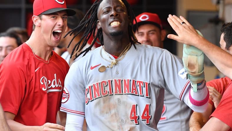 Jul 8, 2023; Milwaukee, Wisconsin, USA; Cincinnati Reds shortstop Elly De La Cruz (44) celebrates in the dugout after scoring a run against the Milwaukee Brewers in the seventh inning at American Family Field. Mandatory Credit: Michael McLoone-USA TODAY Sports