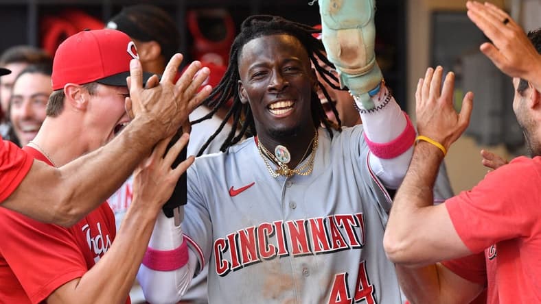 Jul 8, 2023; Milwaukee, Wisconsin, USA; Cincinnati Reds shortstop Elly De La Cruz (44) celebrates in the dugout after scoring a run against the Milwaukee Brewers in the seventh inning at American Family Field. Mandatory Credit: Michael McLoone-USA TODAY Sports
