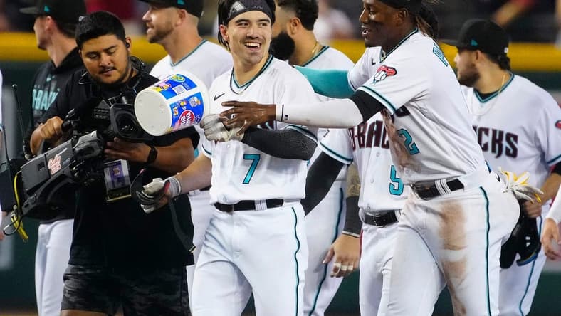 July 8, 2023; Phoenix, Ariz.; USA; Diamondbacks outfielder Corbin Carroll celerbates an RBI against the Pirates for a walk-off win in the 10th inning during a game at Chase Field.
