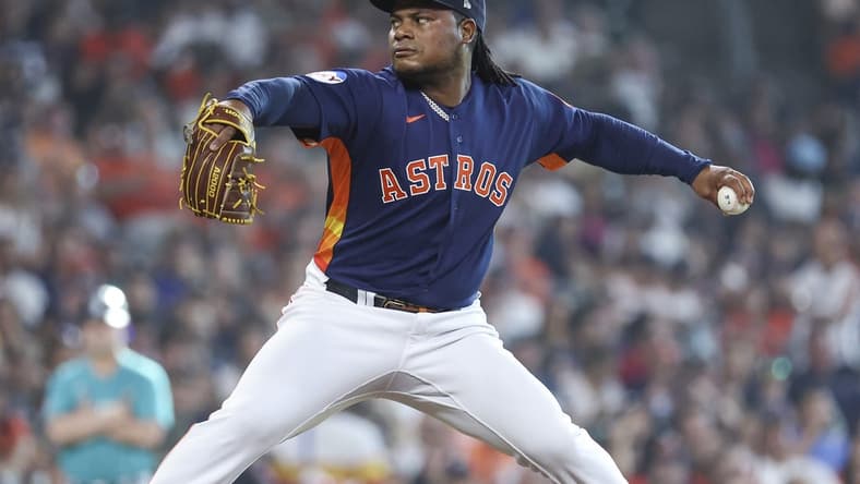 Jul 8, 2023; Houston, Texas, USA; Houston Astros starting pitcher Framber Valdez (59) delivers a pitch during the first inning against the Seattle Mariners at Minute Maid Park. Mandatory Credit: Troy Taormina-USA TODAY Sports