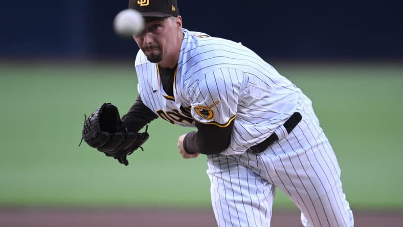 Jul 8, 2023; San Diego, California, USA; San Diego Padres starting pitcher Blake Snell (4) throws a pitch against the New York Mets during the first inning at Petco Park. Mandatory Credit: Orlando Ramirez-USA TODAY Sports