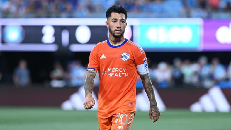 Jul 8, 2023; Charlotte, North Carolina, USA; FC Cincinnati midfielder Luciano Acosta (10) looks down the field in the first half against Charlotte FC at Bank of America Stadium. Mandatory Credit: Griffin Zetterberg-USA TODAY Sportsfc