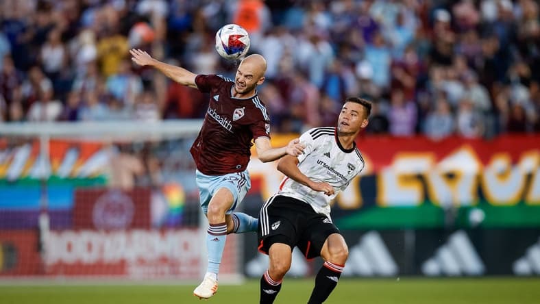 Jul 8, 2023; Commerce City, Colorado, USA; Colorado Rapids defender Andrew Gutman (13) and FC Dallas defender Sam Junqua (29) battle for the ball in the first half at Dick's Sporting Goods Park. Mandatory Credit: Isaiah J. Downing-USA TODAY Sports