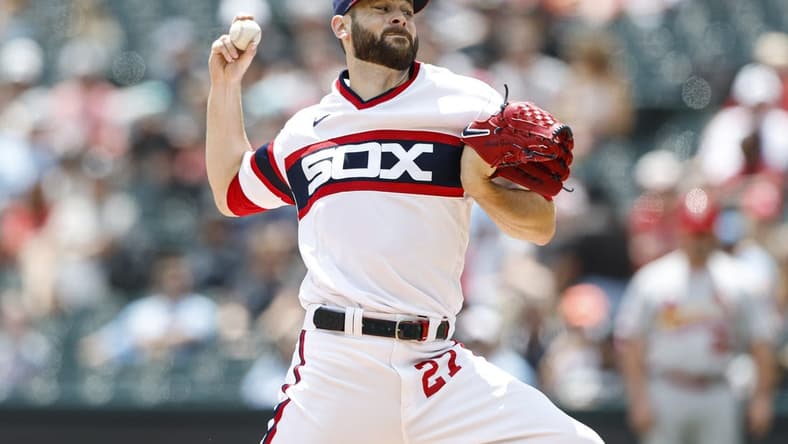 Jul 9, 2023; Chicago, Illinois, USA; Chicago White Sox starting pitcher Lucas Giolito (27) delivers a pitch against the St. Louis Cardinals during the first inning at Guaranteed Rate Field. Mandatory Credit: Kamil Krzaczynski-USA TODAY Sports