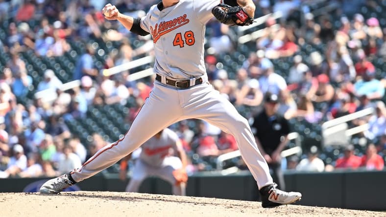 Jul 9, 2023; Minneapolis, Minnesota, USA; Baltimore Orioles starting pitcher Kyle Gibson (48) throws a pitch against the Minnesota Twins during the sixth inning at Target Field. Mandatory Credit: Jeffrey Becker-USA TODAY Sports