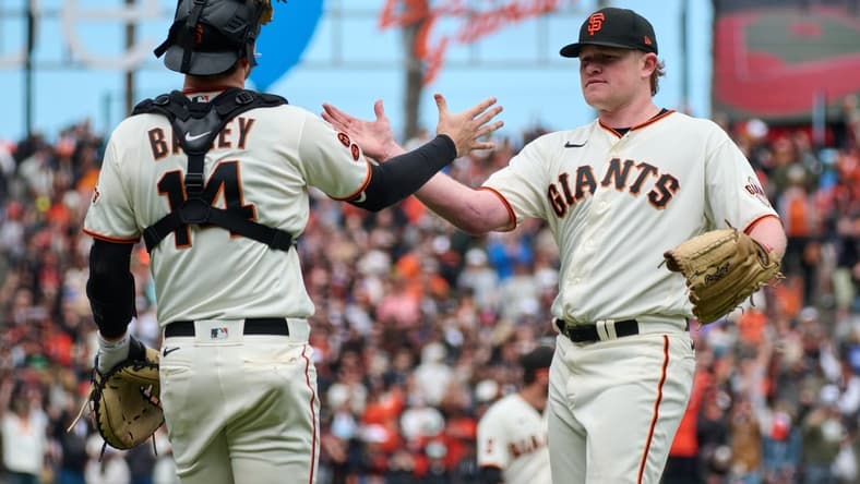 Jul 9, 2023; San Francisco, California, USA; San Francisco Giants pitcher Logan Webb (62) shakes hands with catcher Patrick Bailey (14) after the final out of the ninth inning against the Colorado Rockies at Oracle Park. Mandatory Credit: Robert Edwards-USA TODAY Sports
