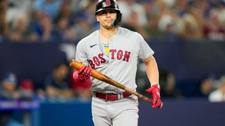 Jul 2, 2023; Toronto, Ontario, CAN; Boston Red Sox shortstop Enrique Hernandez (5) reacts to a striking out against the Toronto Blue Jays at Rogers Centre. Mandatory Credit: Kevin Sousa-USA TODAY Sports