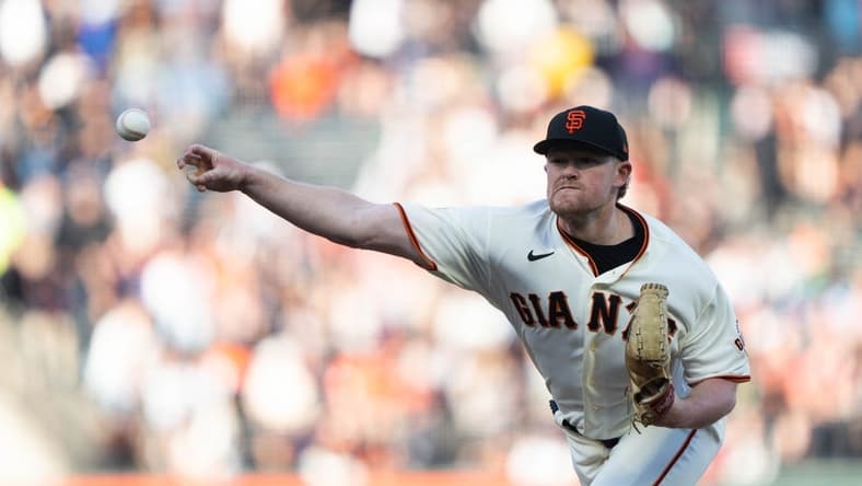 Jul 3, 2023; San Francisco, California, USA;  San Francisco Giants starting pitcher Logan Webb (62) pitches during the first inning against the Seattle Mariners at Oracle Park. Mandatory Credit: Stan Szeto-USA TODAY Sports