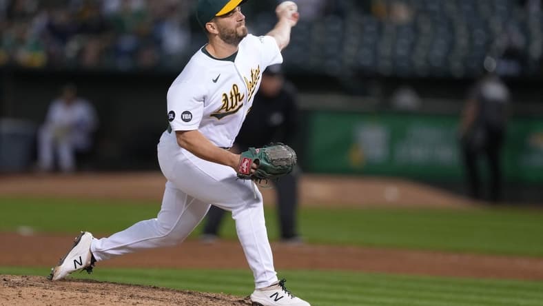 Jun 30, 2023; Oakland, California, USA; Oakland Athletics relief pitcher Sam Moll (60) throws a pitch against the Chicago White Sox during the eighth inning at Oakland-Alameda County Coliseum. Mandatory Credit: Darren Yamashita-USA TODAY Sports