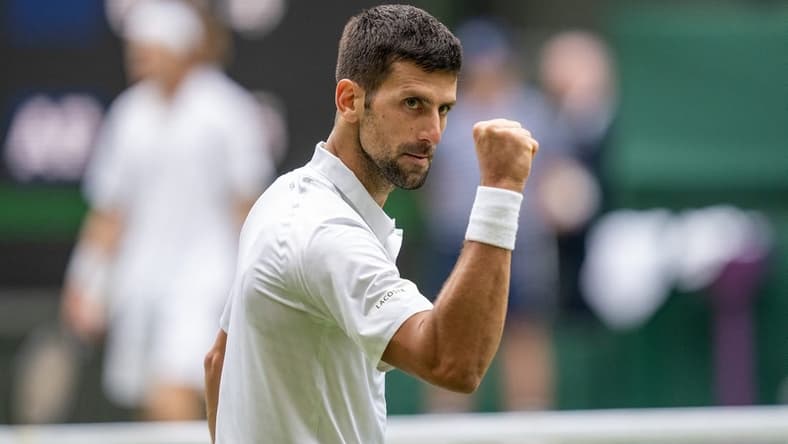 Jul 11, 2023; London, United Kingdom; Novak Djokovic (SRB) reacts to a point during his match against Andrey Rublev on day nine at the All England Lawn Tennis and Croquet Club. Mandatory Credit: Susan Mullane-USA TODAY Sports