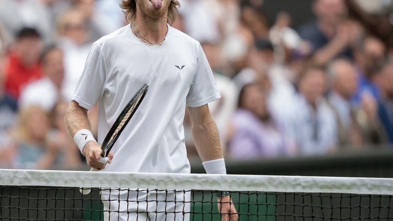 Jul 11, 2023; London, United Kingdom; Andrey Rublev reacts to a point during his match against Novak Djokovic (SRB) on day nine at the All England Lawn Tennis and Croquet Club. Mandatory Credit: Susan Mullane-USA TODAY Sports