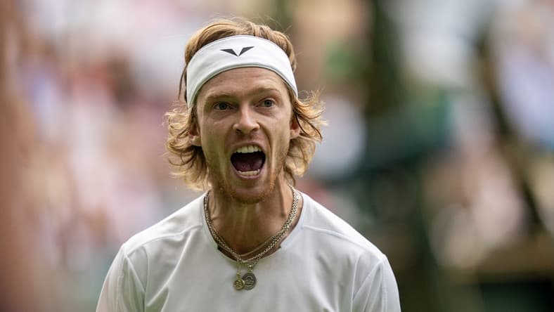 Jul 11, 2023; London, United Kingdom; Andrey Rublev reacts to a point during his match against Novak Djokovic (SRB) on day nine at the All England Lawn Tennis and Croquet Club. Mandatory Credit: Susan Mullane-USA TODAY Sports