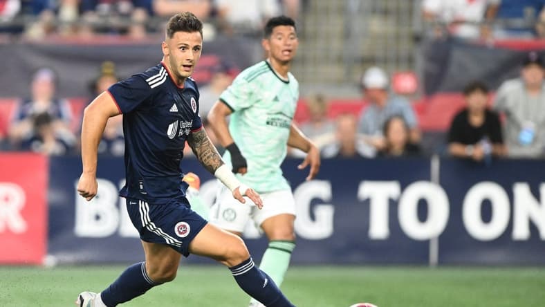 oJul 12, 2023; Foxborough, Massachusetts, USA; New England Revolution forward Giacomo Vrioni (9) passes the ball against the Atlanta United during the first half at Gillette Stadium. Mandatory Credit: Brian Fluharty-USA TODAY Sports
