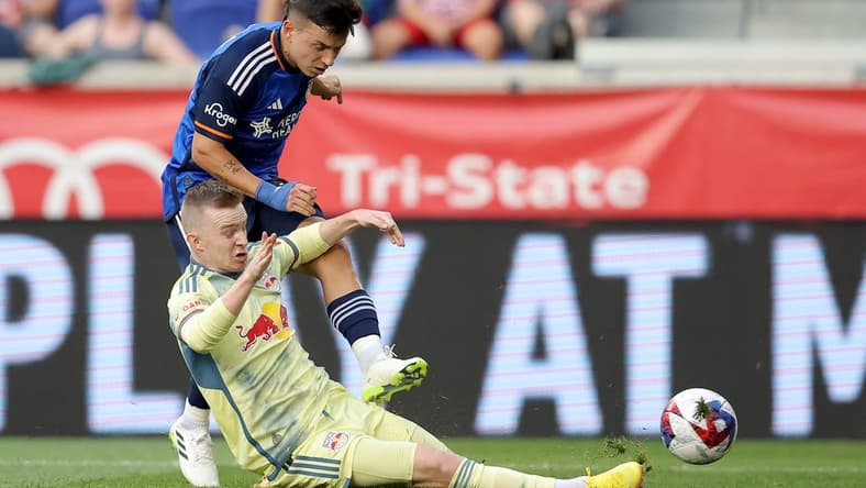 Jul 12, 2023; Harrison, New Jersey, USA; New York Red Bulls forward Cameron Harper (17) blocks a shot by FC Cincinnati midfielder Alvaro Barreal (31) during the first half at Red Bull Arena. Mandatory Credit: Brad Penner-USA TODAY Sports