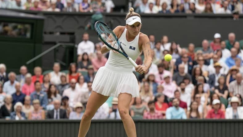 Jul 13, 2023; London, United Kingdom; Marketa Vondrousova (CZE) returns a shot during her match against Elina Svitolina (UKR) on day 11 at the All England Lawn Tennis and Croquet Club. Mandatory Credit: Susan Mullane-USA TODAY Sports