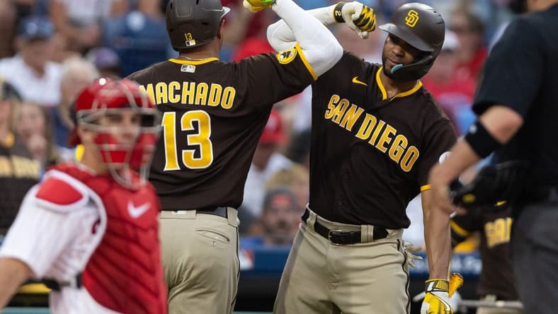 Jul 14, 2023; Philadelphia, Pennsylvania, USA; San Diego Padres third baseman Manny Machado (13) celebrates with shortstop Xander Bogaerts (2) after hitting a home run during the sixth inning against the Philadelphia Phillies at Citizens Bank Park. Mandatory Credit: Bill Streicher-USA TODAY Sports