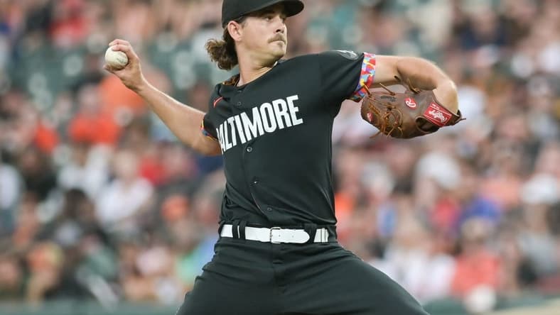 Jul 14, 2023; Baltimore, Maryland, USA;  Baltimore Orioles starting pitcher Dean Kremer (64) delivers a first inning pitch against the Miami Marlins at Oriole Park at Camden Yards. Mandatory Credit: Tommy Gilligan-USA TODAY Sports