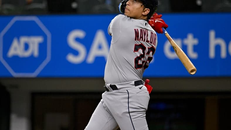 Jul 14, 2023; Arlington, Texas, USA; Cleveland Guardians catcher Bo Naylor (23) bats against the Texas Rangers during the fourth inning at Globe Life Field. Mandatory Credit: Jerome Miron-USA TODAY Sports