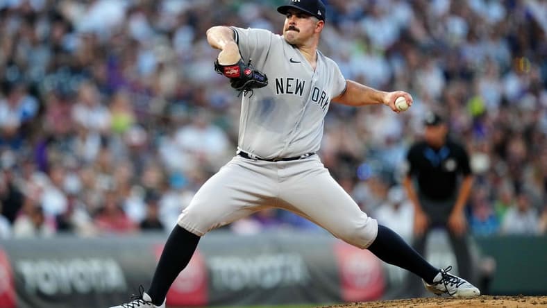 Jul 14, 2023; Denver, Colorado, USA; New York Yankees starting pitcher Carlos Rodon (55) pitches in fifth inning against the Colorado Rockies at Coors Field. Mandatory Credit: Ron Chenoy-USA TODAY Sports