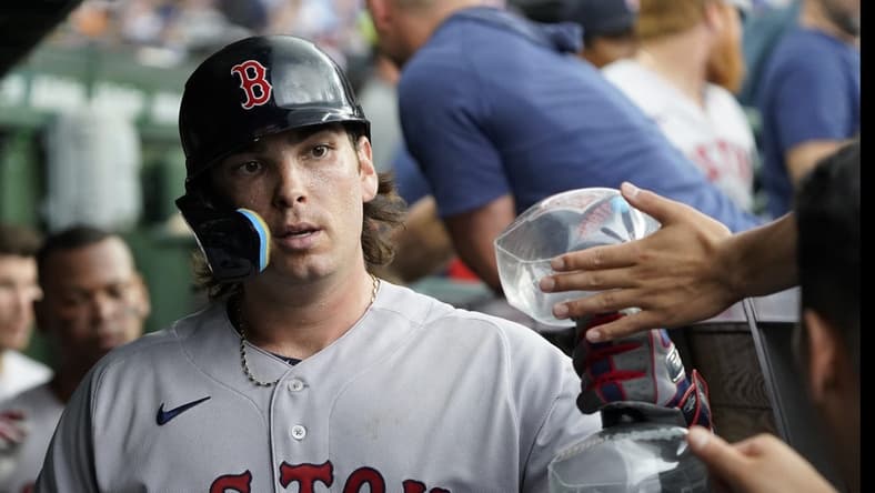Jul 15, 2023; Chicago, Illinois, USA; Boston Red Sox first baseman Triston Casas (36) is greeted in the dugout after hitting a two-run home run against the Chicago Cubs during the seventh inning at Wrigley Field. Mandatory Credit: David Banks-USA TODAY Sports