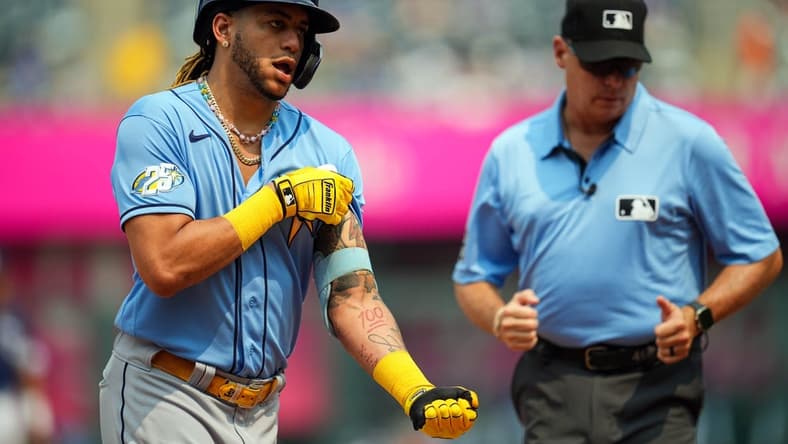 Jul 15, 2023; Kansas City, Missouri, USA; Tampa Bay Rays center fielder Jose Siri (22) celebrates after hitting a home run during the ninth inning against the Kansas City Royals at Kauffman Stadium. Mandatory Credit: Jay Biggerstaff-USA TODAY Sports