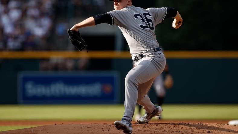 Jul 15, 2023; Denver, Colorado, USA; New York Yankees starting pitcher Clarke Schmidt (36) pitches in the first inning against the Colorado Rockies at Coors Field. Mandatory Credit: Isaiah J. Downing-USA TODAY Sports