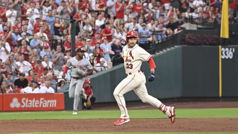 Jul 15, 2023; St. Louis, Missouri, USA; St. Louis Cardinals Brendan Donovan (33) looks on after hitting a 2-run triple against the Washington Nationals during the second inning in game 2 of a double header at Busch Stadium. Mandatory Credit: Jeff Le-USA TODAY Sports