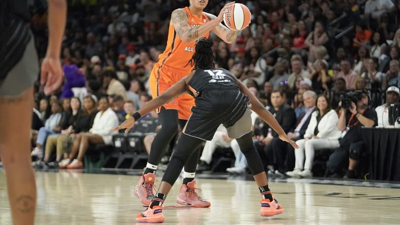 Jul 15, 2023; Las Vegas, NV, USA; Team Stewart frontcourt Brittney Griner (42) controls the ball against Team Wilson guard Chelsea Gray (12) during the first half in the 2023 WNBA All-Star Game at Michelob Ultra Arena. Mandatory Credit: Lucas Peltier-USA TODAY Sports