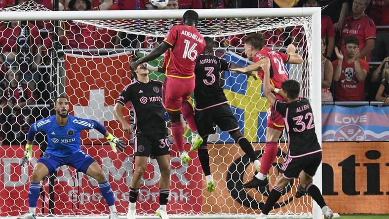 Jul 15, 2023; St. Louis, Missouri, USA; St. Louis City player Samuel Adeniran (16) heads the ball for a goal against Inter Miami midfielder Dixon Arroyo (3) and Inter Miami goalkeeper Drake Callender (1) in the first half at CITYPARK. Mandatory Credit: Scott Rovak-USA TODAY Sports