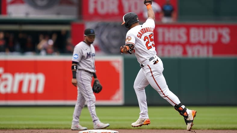 Jul 16, 2023; Baltimore, Maryland, USA; Baltimore Orioles outfielder Anthony Santander (25) rounds the bases following his two run home run in the first inning against the Miami Marlins at Oriole Park at Camden Yards. Mandatory Credit: Mitch Stringer-USA TODAY Sports