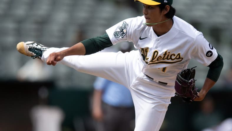 Jul 16, 2023; Oakland, California, USA; Oakland Athletics pitcher Shintaro Fujinami (11) delivers a pitch against the Minnesota Twins during the eighth inning at Oakland-Alameda County Coliseum. Mandatory Credit: D. Ross Cameron-USA TODAY Sports
