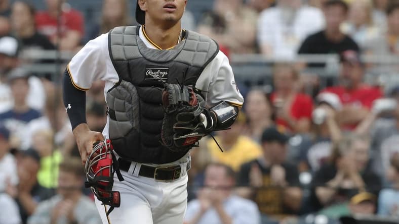 Jul 17, 2023; Pittsburgh, Pennsylvania, USA; Pittsburgh Pirates catcher Endy Rodriguez (25) jogs off of the field in his major league debut against the Cleveland Guardians during the first inning at PNC Park. Mandatory Credit: Charles LeClaire-USA TODAY Sports
