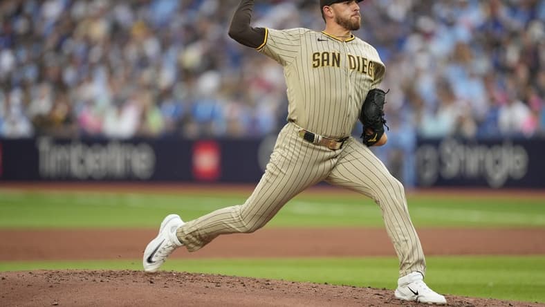 Jul 18, 2023; Toronto, Ontario, CAN; San Diego Padres starting pitcher Joe Musgrove (44) pitches to the Toronto Blue Jays during the first inning at Rogers Centre. Mandatory Credit: John E. Sokolowski-USA TODAY Sports