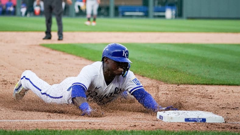 Jul 18, 2023; Kansas City, Missouri, USA; Kansas City Royals right fielder Dairon Blanco (44) reaches on a one run triple against the Detroit Tigers in the third inning at Kauffman Stadium. Mandatory Credit: Denny Medley-USA TODAY Sports