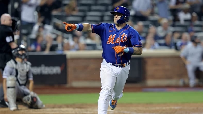 Jul 18, 2023; New York City, New York, USA; New York Mets catcher Francisco Alvarez (4) points into the dugout as he rounds the bases after hitting a two run home run against the Chicago White Sox during the sixth inning at Citi Field. Mandatory Credit: Brad Penner-USA TODAY Sports