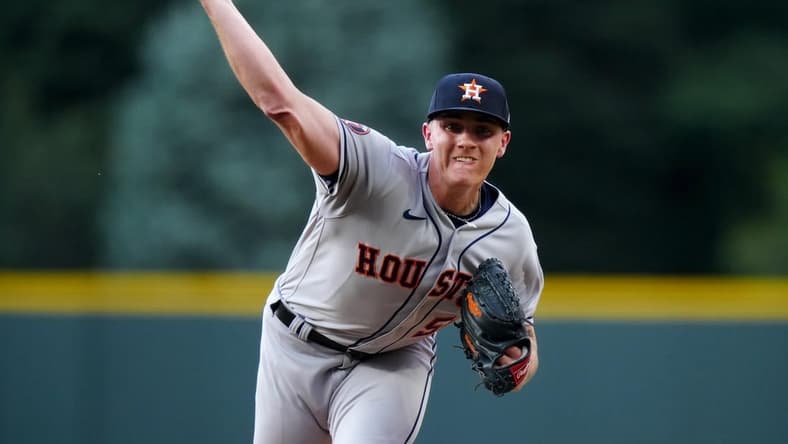 Jul 18, 2023; Denver, Colorado, USA; Houston Astros starting pitcher Hunter Brown (58) delivers a pitch in the first inning against the Colorado Rockies at Coors Field. Mandatory Credit: Ron Chenoy-USA TODAY Sports