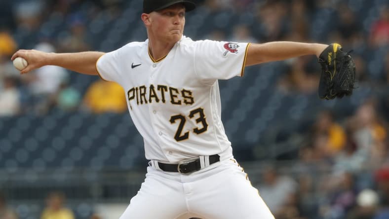 Jul 18, 2023; Pittsburgh, Pennsylvania, USA;  Pittsburgh Pirates starting pitcher Mitch Keller (23) delivers a pitch against the Cleveland Guardians during the first inning at PNC Park. Mandatory Credit: Charles LeClaire-USA TODAY Sports