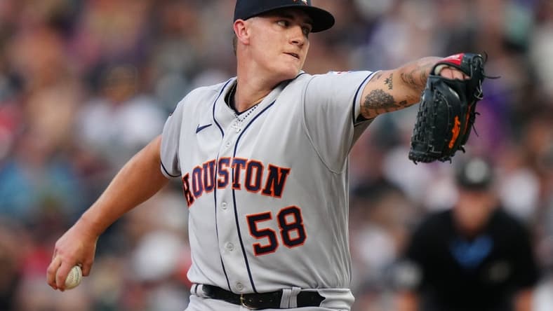 Jul 18, 2023; Denver, Colorado, USA; Houston Astros starting pitcher Hunter Brown (58) delivers a pitch in the fourth inning against the Colorado Rockies at Coors Field. Mandatory Credit: Ron Chenoy-USA TODAY Sports