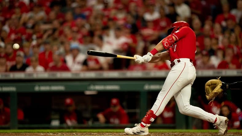 Cincinnati Reds first baseman Spencer Steer (7) hits a base hit in the second inning of the MLB baseball game between the Cincinnati Reds and San Francisco Giants at Great American Ball Park in Cincinnati on Tuesday, July 18, 2023.