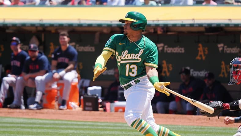 Jul 19, 2023; Oakland, California, USA; Oakland Athletics second baseman Jordan Diaz (13) hits a single against the Boston Red Sox during the fifth inning at Oakland-Alameda County Coliseum. Mandatory Credit: Kelley L Cox-USA TODAY Sports